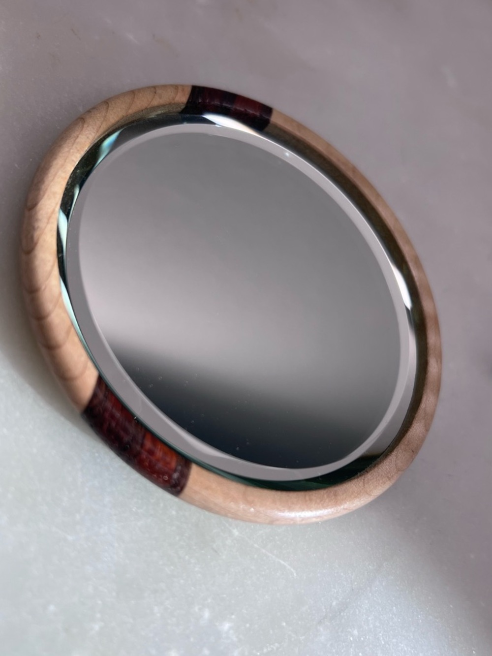 Round Handheld Mirror with Wood and Dark Inlay